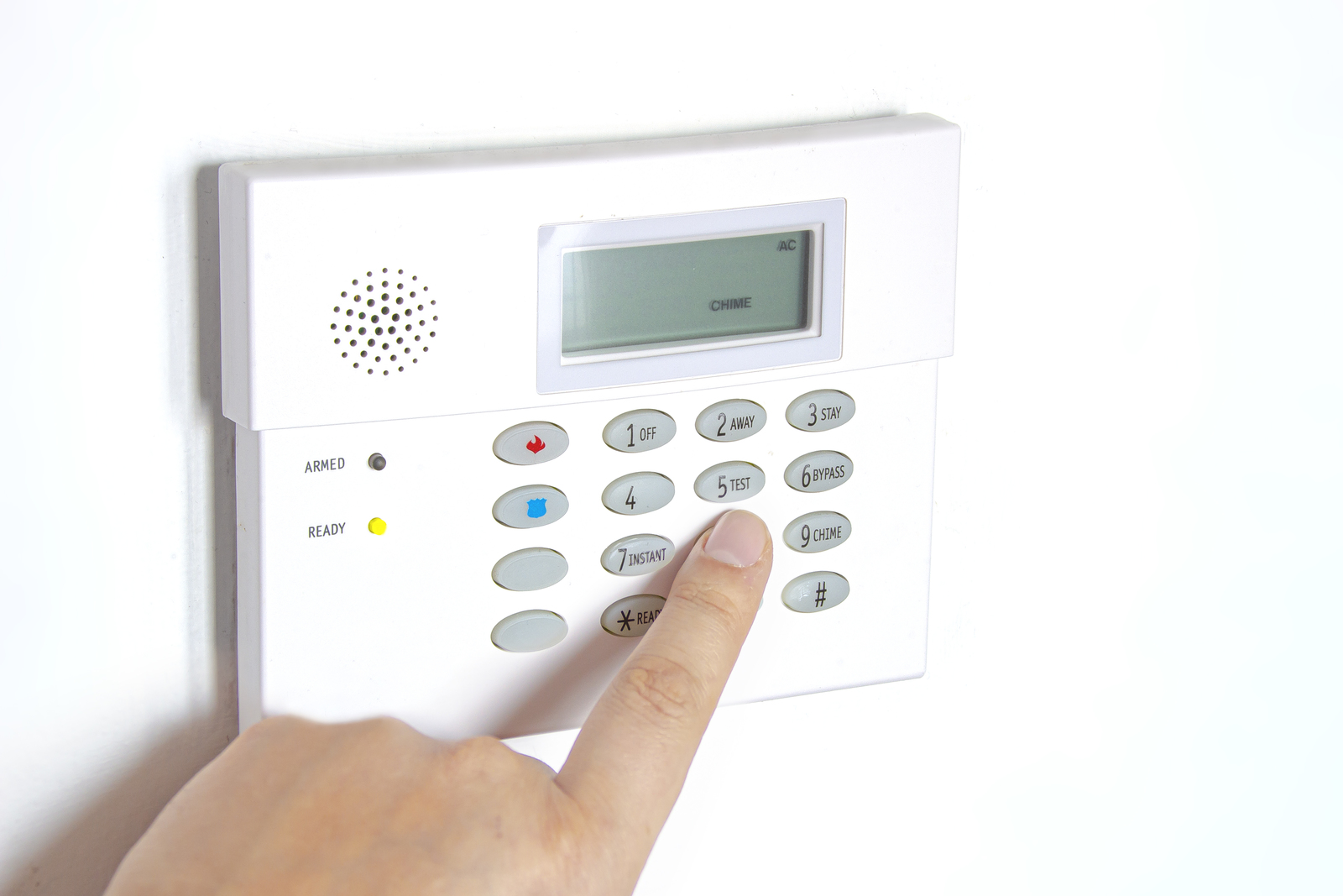 29886634_home-alarm-panel-to-control-security-system-with-a-persons-hand The Best Alarm System For Your Home